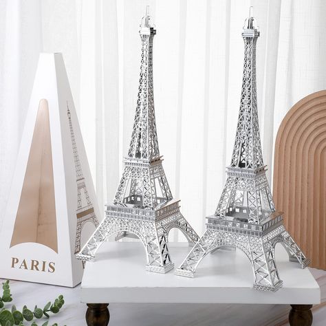 PRICES MAY VARY. Sufficient Number: you will receive 2 pieces of silver Eiffel Tower decors, sufficient quantity to meet your needs, convenient for you to change, trade and apply, increasing the sense of decoration of the house, adding artistic flavor to life, making your mood more beautiful Stable Material: the Eiffel Tower centerpieces for tables are made of alloy metal material, light in weight, not easy to break, not too much pressure on the tabletop, with bright colors, not easy to fade, du Paris Theme Centerpieces, Eiffel Tower Model, Eiffel Tower Centerpiece, Eiffel Tower Lights, Eiffel Tower Decorations, Parisian Party, Tower Models, Paris Tower, Statue Decor