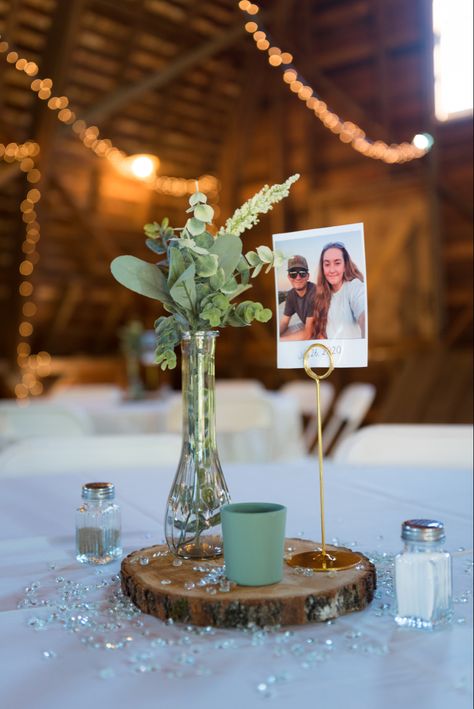 Simple Engagement Centerpieces, Centerpieces With Photos In Them, Centerpiece With Picture Frame, Picture Table Centerpieces Wedding, Simple Wedding Centerpieces Wood Slice, Table Photo Centerpieces, Simple Photo Centerpieces, Simple Wood Centerpieces, Photos For Centerpieces