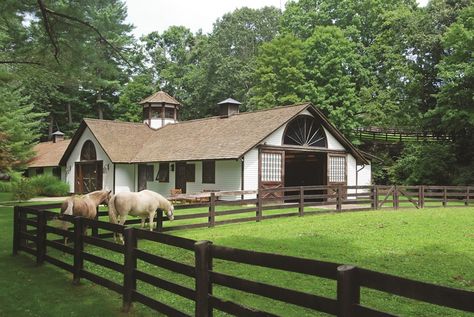 Set against a scenic landscape of verdant countryside, a classic Tudor-style mansion and pristine state-of-the-art equestrian facilities offer the ultimate haven of privacy and relaxation. Equestrian Barns, Equestrian Stables, Dream Stables, Dream Horse Barns, Equestrian Estate, Equestrian Facilities, Barn Plans, Dream Barn, Barn Design