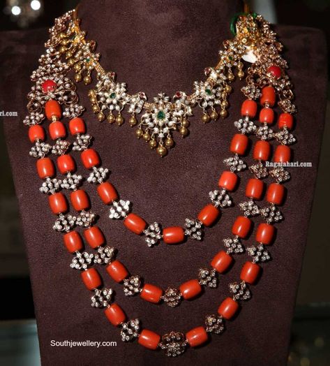 18k gold closed setting peacock diamond necklace and three layered coral beads necklace studded with diamonds. Coral Jewelry Necklace, Diamond Haram, Ruby Jewelry Necklaces, Coral Jewelry Set, Temple Jewelry Necklace, Necklace Photo, Pure Gold Jewellery, Gold Jewelry Outfits, New Gold Jewellery Designs