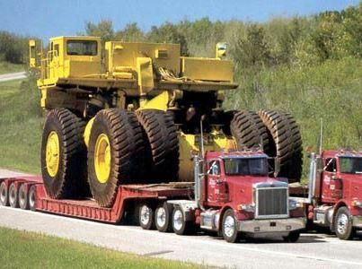 Now that, is some heavy equipment transport Ship Your Car Now http://www.shipyourcarnow.com Truk Besar, Rolling Coal, Big Boy Toys, Big Rig Trucks, Heavy Machinery, Rat Rods, Tractor Trailers, Heavy Truck, Diesel Trucks