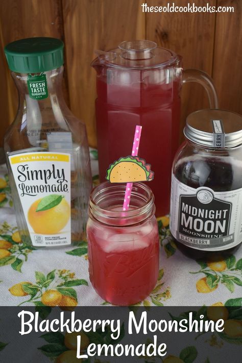 This Blackberry Lemonade is a 2-ingredient cocktail that will soon become your go-to summer drink.  Simply Lemonade is jazzed up with Blackberry Moonshine for the best-ever hard lemonade recipe. Blackberry Moonshine Recipe Cocktails, Huckleberry Moonshine Recipe, Blackberry Lemonade Cocktail, Blackberry Moonshine Cocktails, Moonshine Cocktails Recipes, Blackberry Moonshine Recipe, Moonshine Flavors, Watermelon Moonshine Recipe, Lemonade Moonshine Recipe