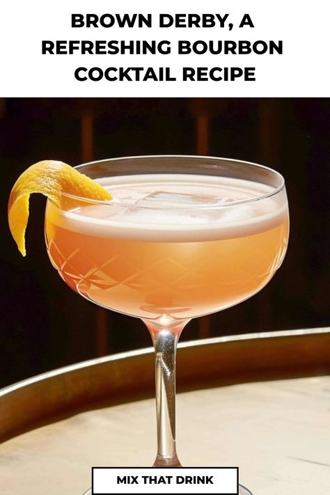 Looking to elevate your summer cocktail game? The Brown Derby cocktail is a must-try! This refreshing drink combines bourbon, grapefruit juice, and honey syrup for the perfect balance of sweet and tangy flavors. Whether you're hosting a backyard BBQ or relaxing by the pool, this classic cocktail is sure to impress your guests. Shake one up today and sip on summertime goodness with every delicious sip of a Brown Derby cocktail! Brown Derby Cocktail, Penicillin Cocktail, Derby Recipe, Bourbon Cocktail Recipe, Party Food Bar, Whiskey Recipes, Bourbon Cocktail, Most Popular Cocktails, Brown Derby