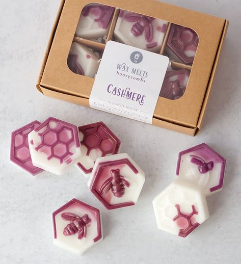 "Cashmere" coconut wax melts, honeycomb designs in white and maroon. Packedin kraft box, with a captivating blend of green leaves, fig, jasmine, wood, moss, light, light musk, light musk, ozone, and green florals. | Elevate your ambiance with our "Cashmere" wax melts, crafted in charming honeycomb shapes in elegant white and maroon hues. Each box contains six meticulously designed pieces, elegantly packed in a kraft box for a touch of rustic charm. Infused with a captivating blend of green leave Cool Wax Melts, Candle Melts Packaging, Wax Melt Designs, Luxury Wax Melts, Wax Melt Gift Box Ideas, Wax Melt Storage Ideas, Unique Wax Melts, Wax Melt Packaging Ideas, Wax Melt Ideas