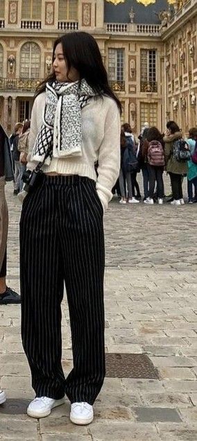 Outfits With Trousers Classy, Black Striped Pants Outfit Winter, Black Pin Stripe Pants Outfit Work, Pinstripe Slacks Outfit, Fold Over Waist Pants Outfit, Baggy Striped Pants Outfit, Casual Pinstripe Pants Outfit, Pinstripes Pants Outfit, Pinstriped Pants Women