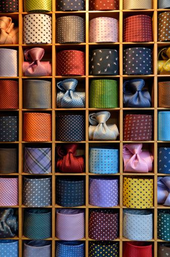 neckties Mens Store Display, Clothing Store Displays, Suit Stores, Clothing Store Interior, Dark Suit, Clothing Store Design, Retail Store Display, Visual Merchandising Displays, Store Design Boutique