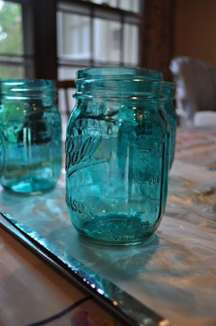 Tinted mason jars are my favorite thing to decorate with in my coastal home. The blue tint makes the mason jar look like it came straight out of the ocean! Here are the materials you will need and steps on how to tint mason jars in no time! Using Modge Podge, Tinted Mason Jars, Mason Jar Projects, Blue Mason Jars, Elmer's Glue, Mason Jar Crafts Diy, Modge Podge, Jar Diy, Mason Jar Crafts