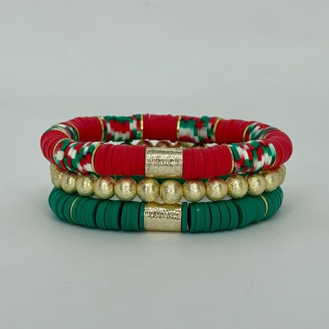 This is the perfect festive Christmas themed Stack. It’s so much fun just stack away with many other Christmas options. Bracelets are “one size fits most” and are designed to fit wrists up to 7.0”. ﻿ *Bracelets usually ship within 3-5 business days. Please be aware that due to the unique and handmade nature of each product, color, shapes, and bead sizes may vary slightly from the photos and description. Christmas Heishi Bracelet, Christmas Clay Bead Bracelets, Xmas Bracelets, Christmas Beaded Bracelets, Swiftie Bracelets, Perle Plate, Heishi Bracelets, Clay Bracelets, Homemade Bracelets