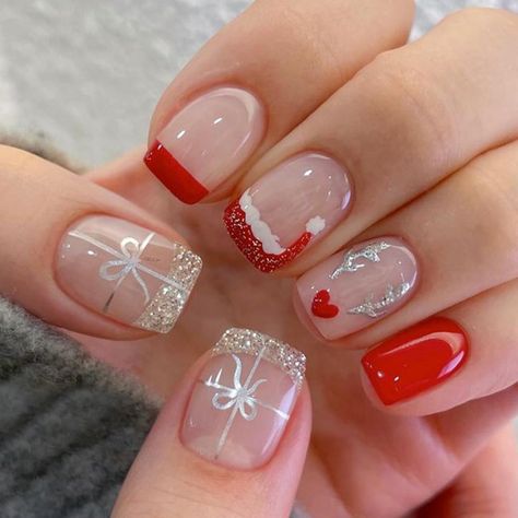 PRICES MAY VARY. 【Christmas Decorations Press On Nails】：SHANRUN all fake nails, press on nails, nail kits are made of environ-mentally friendly acrylic resin material, which is non-toxic, tasteless and environmentally friendly, won’t hurt your hands.Get salon-like nails in 5 mins! 【What You Will Get】:A box contains 24 fake nails, a nail file and 24 jelly glues,an orange wood stick, a set of cleaning cotton,the fake nails are divided into 12 different sizes.The soft elastic and seamless cuticle l Christmas Press On Nails Short, Holiday Nails Snowmen, Christmas Short Press On Nails, Kids Christmas Press On Nails, Pink Nail Tips, Cute Fake Nails, Nails With Silver Glitter, Nails With Silver, Christmas Press On Nails