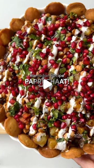 The Cook Project on Instagram: "PAPRI CHAAT!
Spicy, tangy and incredibly good… the ultimate desi street food 🥰. This is the perfect ramadan recipe - it’s quick, easy to make and bursts with flavour! 

What you will need: 
- 2 cans of chick peas
- 1 tsp chilli powder & salt 
- 1 diced onion
- 1 tomato (diced) 
- Diced cucumber 
- Papri 
- 2 boiled and diced Potatoes 
- 1 tsp Chaat Masala
- 4 Tbs Yogurt
- Tamarind/ imli sauce (the more the better!) 👀
- 1 Tsp Mint Chutney
- Coriander 🌿 
- Pomegranate (to garnish)

For the mint chutney:
- Blitz a handful of mint, coriander and two green chillies!" Potato Chaat Recipe, Papri Chaat Recipe, Papri Chaat, Ramadan Recipe, Desi Street Food, Mint Chutney, Chaat Recipe, Diced Potatoes, Chaat Masala