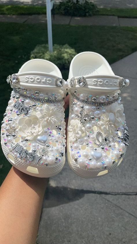 *bridal crocs made for soon to be wife's *crocs will only come in color WHITE. *name changes can be made.. please be specific in personalization box. *please message me for any other questions Pearl Crocs Shoes, Cute Croc Designs, Wedding Crocs For Bride, Bridal Crocs, Baddie Crocs, Customized Crocs Shoes, Blinged Crocs, Croc Designs, Bedazzled Things