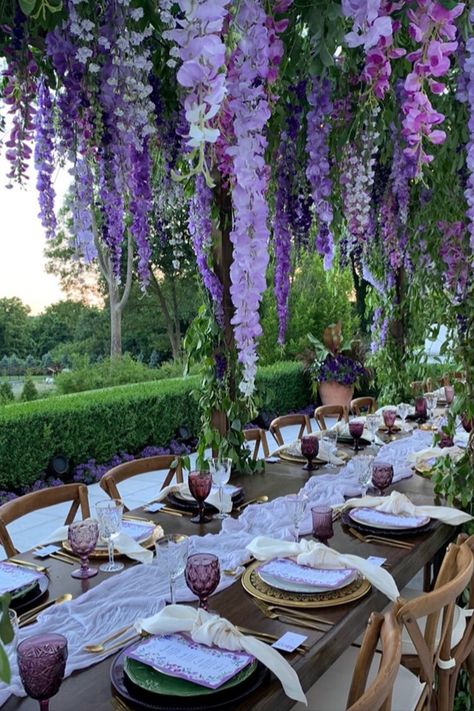 Fairy Tail Wedding Colors, Green And Purple Themed Party, Wisteria Themed Quince, Wisteria Quinceanera Theme, Emerald Green And Purple Quinceanera Theme, Wisteria Themed Party, Purple Forest Wedding Theme, Purple And Green Wedding Aesthetic, Purple Fairy Wedding Theme