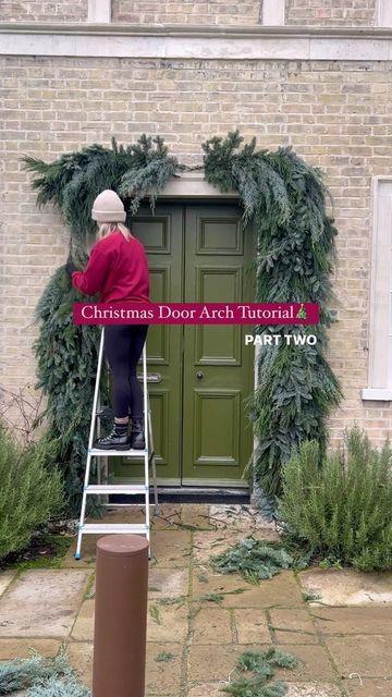 32K views · 1.2K likes | ALEX | DIY, Upcycling & Lifestyle on Instagram: "CHRISTMAS DOOR ARCH TUTORIAL PART TWO 🎄 The foliage is added & she’s turning into a beauty! Im still trying to decide whether to add a red bow at the top or not - what do you think? Don’t forget to check back tomorrow for the full reveal! 😍 #doorarch #christmasdoor #christmasarch #diychristmas #christmasdecor #christmasdoorarch #christmaswreath" Arched Window Christmas Decor, Door Arch Christmas Decor, Christmas Door Arch Diy, How To Make A Christmas Door Arch, Ornament Archway Diy, Christmas Archway Decor Indoor Diy, Diy Christmas Arch, Arch Christmas Decor, Christmas Door Arch