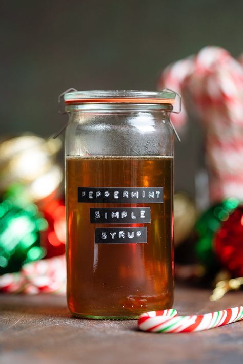 This Peppermint Syrup is the perfect Christmas syrup for coffee, peppermint hot chocolate, or any Christmas cocktail you want to add peppermint flavor to and a little sweetness instead of classic simple syrup. It's really easy to make with just 3 ingredients! Peppermint Coffee Syrup, Peppermint Syrup Recipe, Syrup For Coffee, Peppermint Martini, Peppermint Coffee, Mini Ice Cube Tray, Peppermint Syrup, Chocolate Cocktails, Mint Simple Syrup