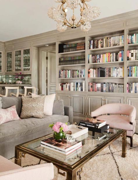 Living room in greige neutrals and pink:To make it fresh, use lots of creamy white and don’t be afraid to add warmer, more classic wood tones. It seems counter intuitive, but warm walnuts and golden mahogany look great with taupe. Taupe wood tones don’t need to be endlessly matched and repeated, don’t be afraid to mix it up.Go glam with metallics, taupe works well with bronze, aged brass, nickel and pewter. #LivingRoomFurniture Home Library Design, Home Libraries, Beautiful Living Rooms, Home Library, A Living Room, 인테리어 디자인, Room Interior, Home Remodeling, Bookshelves