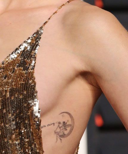 Lily Collins New Tattoo | Lily Collins debuted a new tiny tat. #refinery29 http://www.refinery29.com/2016/03/105162/lily-collins-new-tattoo Fairy Tale Tattoo, Get Ex Back, Fairy Tattoo Designs, Get Your Ex Back, Fairy Tattoo, Custom Tattoo Design, Lily Collins, Custom Tattoo, Pretty Tattoos