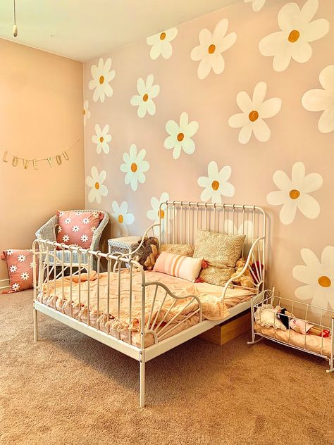 Paint Daughters Room, Painted Flower Wall Nursery, Daisy Painted Wall, Ikea Minnen Bedding, Diy Painted Daisy Wall, Daisies Painted On Wall, Daisy On Wall, Diy Daisy Wall Paint, Flower Accent Wall Nursery