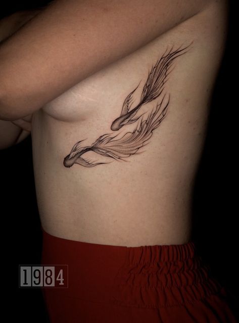 The Meaning Behind Koi Fish Tattoo | 1984 Studio - Tattoo & Piercing Koi Fish Tattoo On Ribs, Koi Fish Tramp Stamp, Fish Tattoo Women, Coy Fish Tattoos, Koi Fish Tattoos, Goldfish Tattoo, Beachy Tattoos, Upper Thigh Tattoos, Tattoo Process