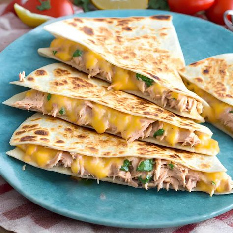 This tuna quesadilla recipe has a crisp exterior and a melt-in-your-mouth filling of tuna and sweetcorn. Canned tuna and sweetcorn topped with gooey melted cheese in a tasty tortilla sandwich. Tuna is a popular food among all people, and this recipe is no exception. Every bite is bursting with flavour and cheesy goodness. This recipe […] The post Tuna Quesadilla appeared first on Scrumptiously. Tuna And Sweet Corn Sandwich, Tuna Sweetcorn Sandwich, Tuna Melt Tortilla, Tuna Corn Sandwich, Tuna Cheese Melt, Chicken Tuna Recipes, Tuna Melt Quesadilla, Tuna Quesadilla Recipes, Tuna For Breakfast