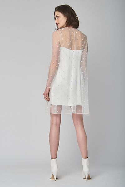 Alexandra Grecco pearl cape wedding gown. #capeweddinggown #shortweddingdress #pearlpolkadots Wedding Gown With Pearls, Gown With Pearls, Modern Short Wedding Dress, 1960s Wedding Dresses, Short Bridal Dress, Dress Kondangan, Alexandra Grecco, White Mini Dress Graduation, Mermaid Style Dress