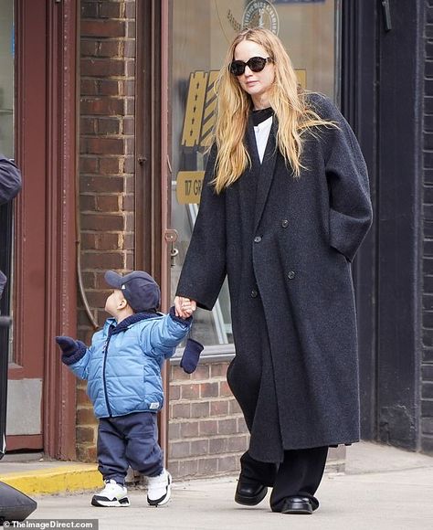 Jennifer Lawrence bundles up with son Cy, one, to brave NYC's chilly weather | Daily Mail Online Jeniffer Lawrance, Jennifer Lawrence Street Style, Jennifer Lawrence Style, Light Blue Jacket, Maxi Coat, Fashion Statements, Celebrity Street Style, Baggy Pants, Chilly Weather