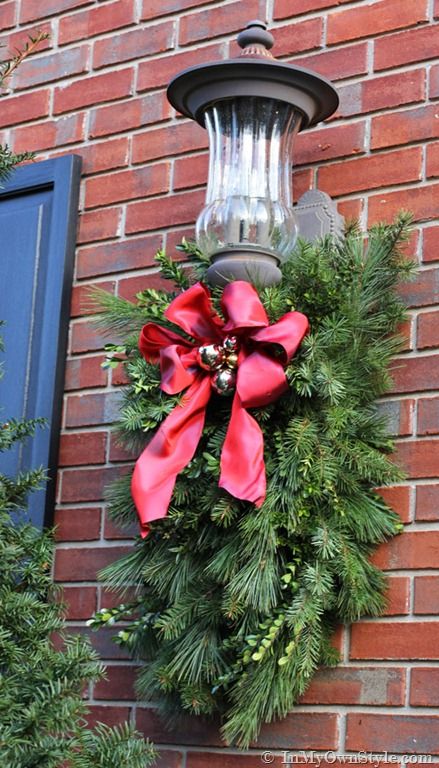 How to Make and Decorate with Holiday Greenery To Hang Over an Outdoor Light | In My Own Style Holiday Greenery, Porch Light, Diy Porch, Christmas Porch Decor, Cheap Christmas, Front Porch Christmas Decor, Christmas Greenery, Christmas Porch, Chicken Wire