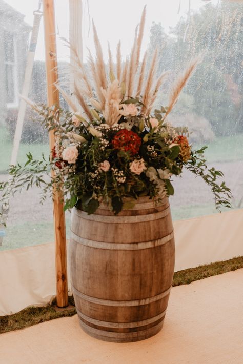 Pampas Grass And Flowers Wedding, Rustic Flowers Arrangements, Large Fall Wedding Floral Arrangements, Pampas Grass Centerpiece Wedding Ideas Diy, Pampas Grass Barrel Arrangement, Flowers On Barrels For Wedding, Barrel Floral Arrangements Wedding, October Farm Wedding, Boho Flower Arrangements Wedding