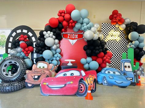 Ka-Chow! Disney Cars themed birthday party. 🏁🏁🏎️⚡️ Been awhile since i last used our custom painted Cars standees. Glad we were able to us… | Instagram Custom Painted Cars, Disney Cars Birthday Decorations, Cars Themed Birthday Party, Disney Cars Birthday Theme, Disney Cars Theme, Ka Chow, Pixar Cars Birthday, Cars Birthday Party Decorations, Wiggles Birthday