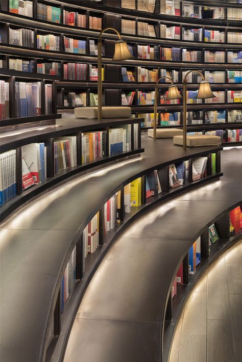 Hangzhou Zhongshuge by Li Xiang Library Lighting, Bookstore Design, Mirror Ceiling, Bookshelf Art, Hangzhou China, Glass Curtain Wall, Library Architecture, Book Cafe, Tree Trunks