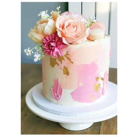 A pretty summery peach & pink cake to celebrate a 60th Birthday. Water colour/ smudge buttercream with texture and gold leaf detail. The… Pink And Gold Cake Decorations, Peach Decorated Cake, Peach Colour Cake, Mother Day Cakes, Pink Colour Cake, Smudge Cake, Pink And Gold Birthday Cake, Pink Buttercream Cake, Textured Cakes