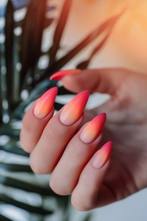 Pink Nail Inspo Perfect for Every Occasion Sunset Inspired Nails, Ombre Hot Pink Nails, Orange Pink Ombre Nails, Summer Ombré Nails, Ombre Orange Nails, Sunset Nails Ombre, Pink Orange Ombre Nails, Pink And Orange Ombre Nails, Orange Pink Nails