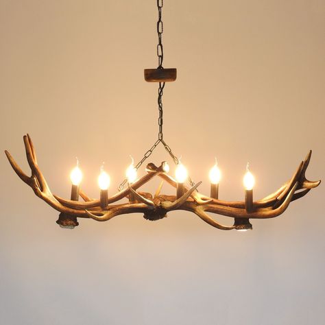 Real deer antler chandelier perfect as pool table light. This antler chandelier is long shape pendant lamp, which has multi lighting system. It means, that this lamp has bulbs pointed up and additional 2 spotlights, which light up everything, what is under lamp. Bulbs pointed up and spotlights may works independent, that is why we recommend this chandelier especially to hang over table, e.g. over pool table. 💡It is for 6 bulbs rated up to 60 Watts, base type E14 and 2 spotlight bulbs.  Spotlight bulbs are included. 📐DIMENTIONS This chandelier is about 20"/50 cm height by default, if you need it lower, or higher, just let us know, about 39"/100 cm lenght and about 18"/45 cm width.  🛠 CONNECTION Our chandeliers are easy to connect, you only need to connect 3 wires from chandelier, to wire Antlers Lamp, Antler Chandelier Dining Room, Antler Light Fixtures, Deer Antler Chandelier, Antler Lamp, Antler Lights, Antler Pendant, Antler Chandelier, Pool Table Lighting