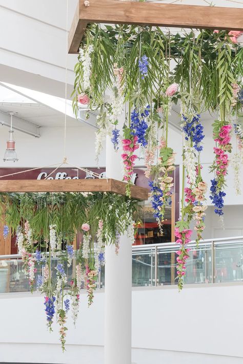 Hanging Spring Decorations, Retail Hanging Display, Spring Back Drop Ideas, Easter Hanging Decorations, Hanging Easter Decorations, Easter Display Retail, Summer Retail Window Displays, Spring Store Displays, Spring Retail Window Displays