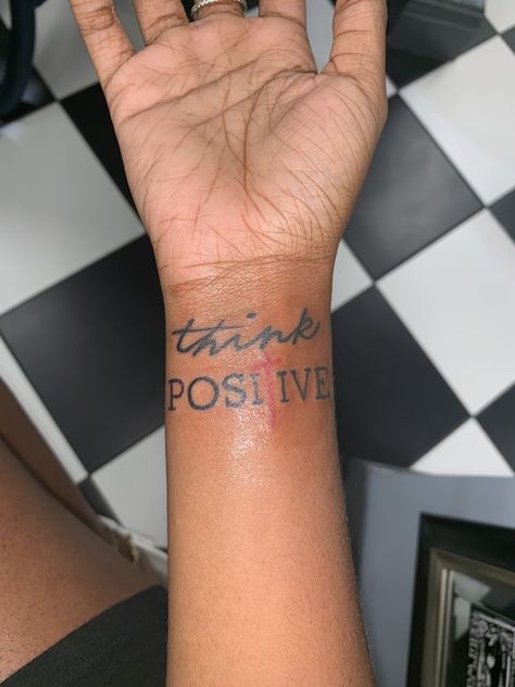 Think Positive Tattoo Men, Wrist Tattoos For Black Women, Small Cute Tattoos For Women Meaningful, Small Tattoos With Meaning Black Women, Side Wrist Tattoos For Women Unique, Wrist Tattoos With Meaning, Cute Wrist Tattoos For Women, Inside Wrist Tattoos For Women, Think Positive Tattoo