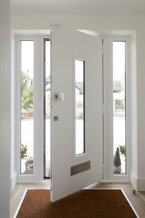 Smooth bright white composite door from Endurance. Floods your hallway with natural light and creates a bright interior. View the full Avantal collection here:https://endurancedoors.co.uk/avantal-doors/ White Composite Front Door, White Door Entrance, Composite Front Doors Uk, Glass Entrance Doors, Front Doors Uk, Upvc Front Door, White Front Door, Composite Front Door, Bright Interior