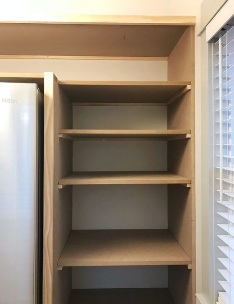 Learn how we constructed DIY pantry shelves in our beach house using a simple construction technique and just two materials: MDF panels and 1x2" boards. Build Pantry Shelves, Build Pantry, Diy Pantry Cabinet, Building Cabinets, Diy Pantry Shelves, Small Kitchen Pantry, Diy Pantry Organization, Diy Storage Shelves, Cocina Diy