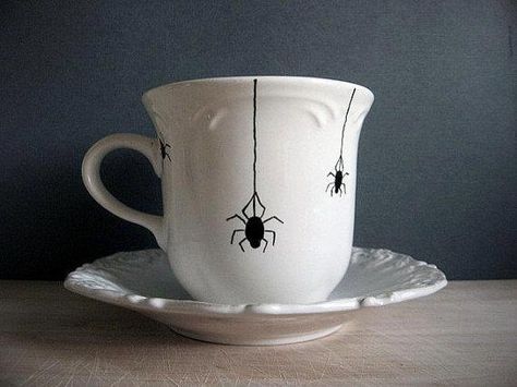 This vintage teacup has been hand painted and could make a unique housewarming gift -- or simply just to decorate any table or room in your own home for Halloween! Description from etsy.com. I searched for this on bing.com/images Spider Mug, Spider Pottery, Ceramic Spider, Spooky Mugs, Darkly Inclined, Halloween Tea Party, Painted Ceramic Plates, Halloween Dishes, Plate Ideas