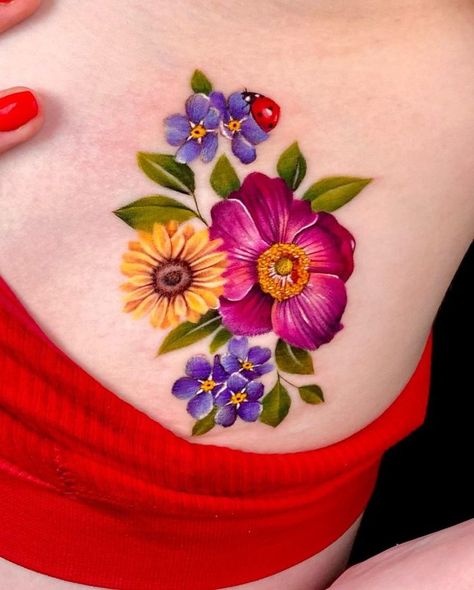 23 Vibrant Color Flower Tattoo Ideas: Embrace Nature's Beauty Flower Tattoo Color Design, Flower Colored Tattoo, Colourful Flower Tattoo, Bright Tattoos For Women, Colored Flower Tattoos, Flower Tattoos Color, Bright Flower Tattoos, Colorful Floral Tattoo, Color Flower Tattoo