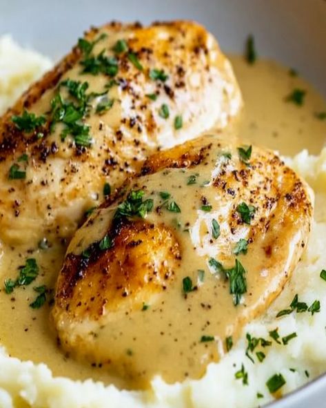 Chicken with creamy Dijon sauce served over mashed potatoes – a delicious, easy one-pan meal perfect for weeknight dinners Baked Chicken Mashed Potatoes, Creamy Chicken And Mashed Potatoes, Creamy Dijon Sauce, Dijon Cream Sauce, Creamy Dijon, Dijon Sauce, Chicken Mashed Potatoes, Over Mashed Potatoes, Fluffy Mashed Potatoes