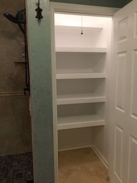 Finally got a custom built linen closet. Replaced the shower stall. Thanks Monty Tile & Home Bathroom Closet Shelves Ideas, Closet In A Bathroom, Convert Shower Stall To Linen Closet, Turn Shower Into Closet, Converting Shower To Closet, Shower To Closet Conversion, Linen Closet Redo, Shower Into Closet, Large Bathroom Closet Ideas