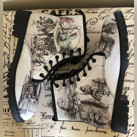 I Am In Love With These “Alice In Wonderland” Themed Boots! With Grey Graphics Over A White Boot, These Have A Black Sole & Edging. Personally, I Like These Boots With A Skirt, But You Use Your Imagination For Pairings!! I Got Some For Myself & These Are Seriously Much Softer Than I Expected! Kind Of Like An Already Broken In Feel! It’s Fabulous!! ***”Like” Now If Interested & I’ll Send You A Notification When They Come In!!!*** Alice In Wonderland Fashion, Alice In Wonderland Shoes, Womens Harley Davidson Boots, Wonderland Aesthetic, White Combat Boots, Shoe Refashion, Already Broken, Black Moto Boots, Beige Boots