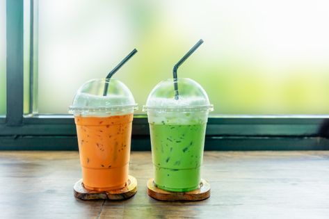 Iced green tea and thai iced tea on wood table. Premium Photo | Premium Photo #Freepik #photo #food #coffee #wood #summer Grass Jelly Drink, Thai Iced Tea, Thai Milk Tea, Grass Jelly, Sugarcane Juice, Iced Green Tea, Thai Street Food, Thai Tea, Balikpapan