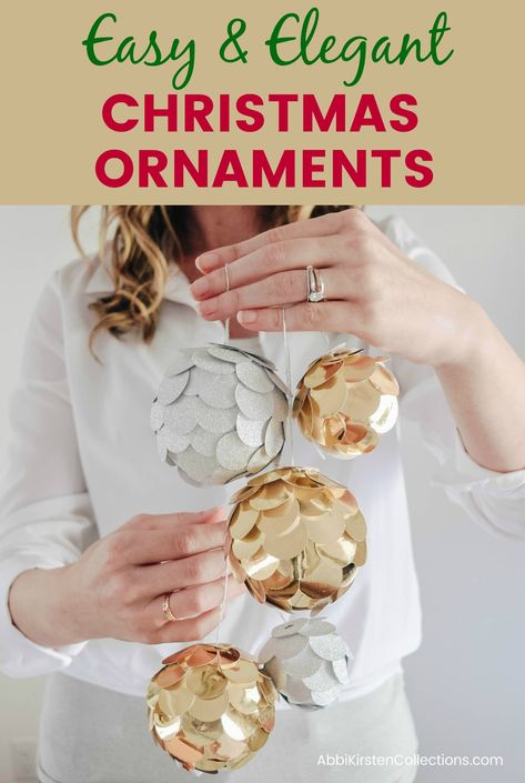 Easy Christmas Ornament Craft: Elegant DIY Silver and Gold Paper Ornaments. Kid friendly DIY Christmas ornaments to deck your halls this holiday season! Pretty Christmas Ornaments, Sparkle Christmas, Christmas Decs, Modern Christmas Ornaments, Easy Christmas Ornaments, Gold Christmas Ornaments, White Christmas Ornaments, Paper Christmas Ornaments, Ornament Craft