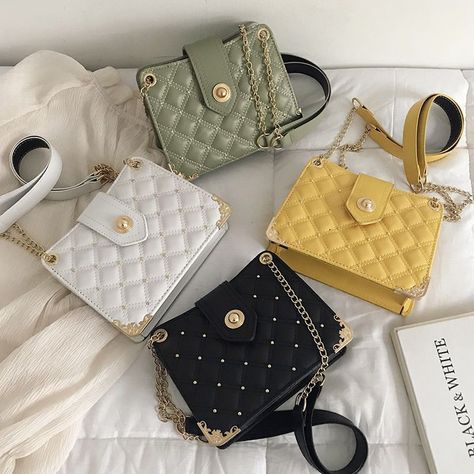 This quilted crossbody bag features a envelope-style fold-over flap embellished with a logo accent. Top handle with gold-tone ends. Magnetic snap-button closure. Product featured: fashion handbag This product is from UNAKU vendors' brand ID: 212V448 NGN 4,000.00 Shop at https://bit.ly/3mJvSbG Call to 07067786808 Pay on delivery available #ladybag #bag #bags #fashionbag #handbag #luxurybag #leatherbag #womenbag #brandbag #fashion #fashionbags #backpack #wallet #ladybags #lv #womensbag #lvlover Beg Tangan, Elegant Bags, Tasmania, Chain Bags, Coach Dinky Crossbody, Sling Bag, Fashion Handbags, Crossbody Shoulder Bag, Leather Fashion