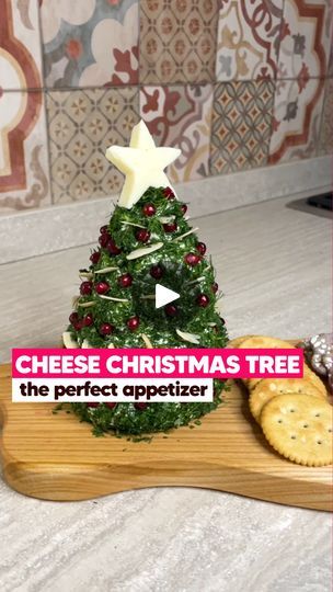 375K views · 2.1K reactions | Our Christmas tree is different 😎🎄 Easy to make and perfect to feed a crowd during the holidays, you'll love it 😍 👉INGREDIENTS 300g of cream cheese Parsley to taste Dill to taste Thyme to taste 100g of flaked almonds 1 Pomegranate 50g of string cheese 👉METHOD 1. Lay several layers of food wrap on the worktop, place the cream cheese in the center, and gently close. 2. Give it a conical shape and let it cool for 1 hour in the fridge. 3. When it's solid pass it in a chopped mix of parsley, dill and thyme. 4. Place it on a cutting board and complete it with strips of almonds and grains of pomegranate. 5. Finally, as a tip, use a piece of cheese carved in the shape of a star, and here is your beautiful tree. Will you try it? 👇 | Cookist Wow | Cookist Wow · Or Cookist Wow, String Cheese, Feed A Crowd, Food Places, Feeding A Crowd, Perfect Appetizers, Unique Recipes, Food Shop, Beautiful Tree