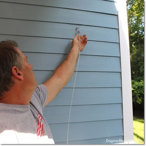 DIY Porch Curtains Made With $10 Shower Curtain Liners Diy Porch Curtains, Porch Privacy, Hot Tub Privacy, Outdoor Curtain Rods, Installing Curtain Rods, Roll Up Curtains, Garage Screen Door, Front Porch Flowers, Half Curtains