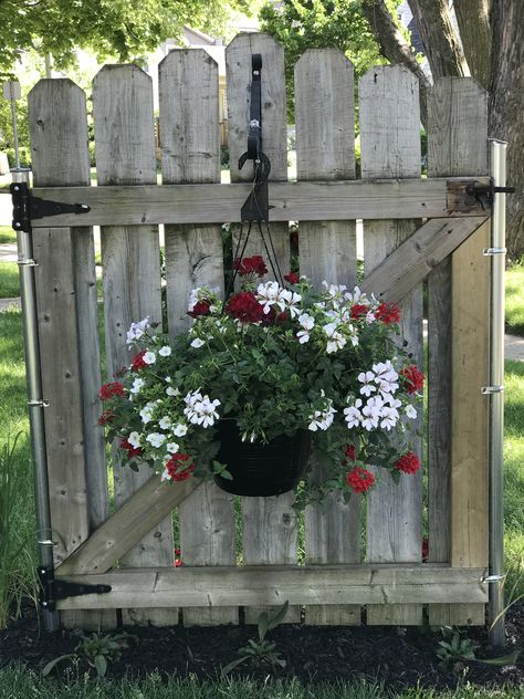 An old garden gate put into our landscaping! Old Gates Repurposed In Garden, Old Wooden Gates Ideas, Garden Gate Decor Ideas, Old Gates In Garden, Old Gates Repurposed, Sliding Gate Ideas, Garden Gate Decor, Old Garden Gates, Outdoor Fence Decor