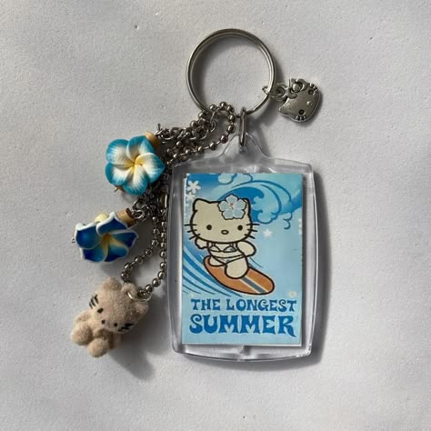 ☆ summer gal keychain ☆ tropical hello kitty + GALS... - Depop Hello Kitty Hawaii Keychain, 2000s Keychains, Summer Keychains, Hello Kitty Hibiscus, Hawaii Keychain, Tropical Hello Kitty, Summer Hello Kitty, Hawaiian Hello Kitty, Blue Hello Kitty