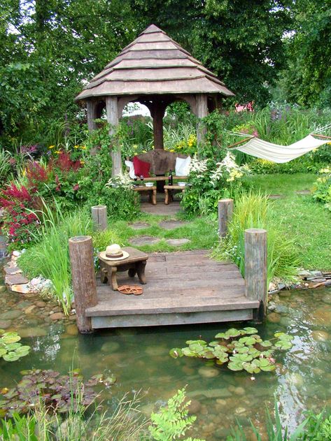 weathered wood gazebo with dock  and pond Wooden Garden Gazebo, Backyard Flowers Garden, Hampton Court Flower Show, Taman Air, Aquatic Garden, Wooden Gazebo, Pond Landscaping, Backyard Flowers, Piscina Natural