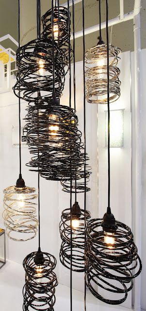 spiral nest metal light fixtures by Ridgely Studio Works Industri Modern, Diy Luminaire, Lampe Diy, Metal Light Fixture, Deco Luminaire, Stil Industrial, Backyard Lighting, Contemporary Chandelier, Barbed Wire